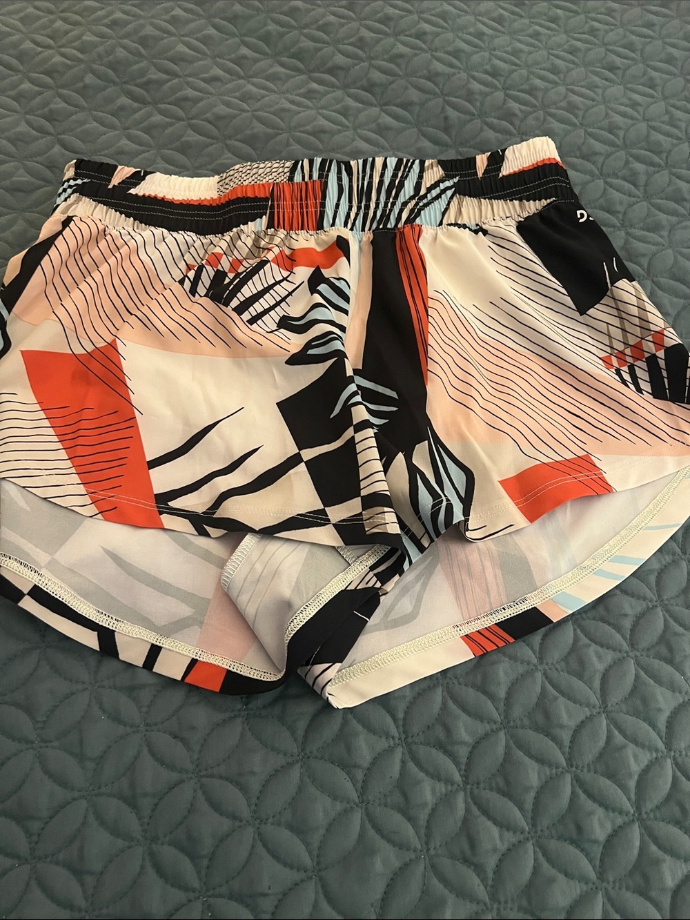 DSG Women's Athletic Shorts in Peach, Black & Orange Abstract Print